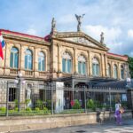 The Costa Rican flag frequently flies in front of the ornate, neoclassical National Theater (Teatro Nacional) in San José,