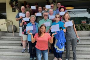 Our happy November 2022 guests after a sample Spanish lesson display their diplomas. Every tour includes this activity which my guests love.