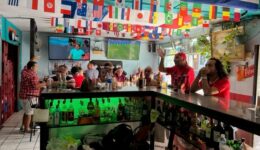 Ticos and gringos watching Costa Rica vs Germany in the World Cup soccer tournament