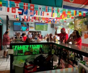 Ticos and gringos watching Costa Rica vs Germany in the World Cup soccer tournament